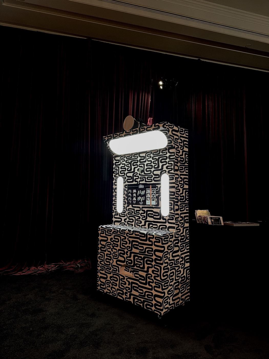 Mochi Booth in a custom black-and-white wrap, lit up at Anika and Kru's wedding at The Ritz-Carlton, Laguna Niguel